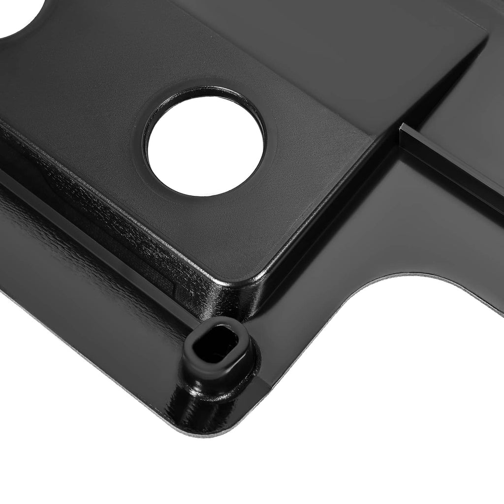 Close-up of dark plastic corner of A/C heat control panel bezel with mounting hole