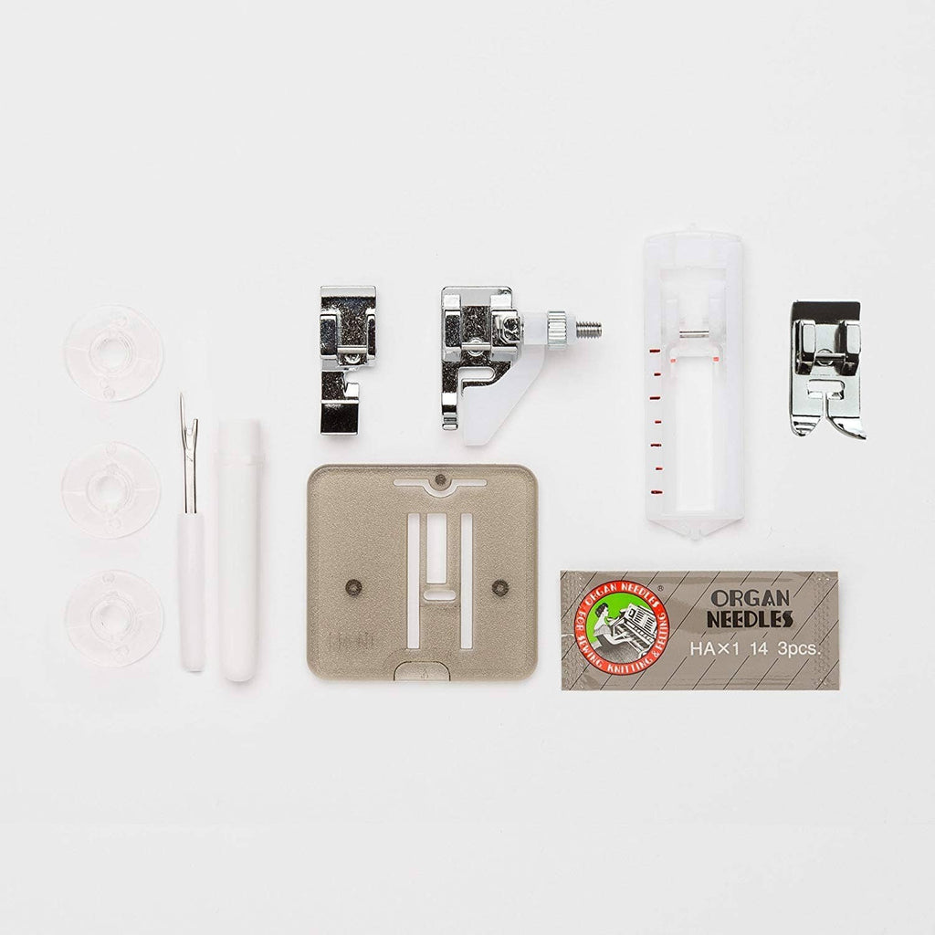 Sewing machine accessory set with presser feet, needle package, and tools