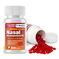 Nasal decongestant tablets bottle with red tablets and white cap
