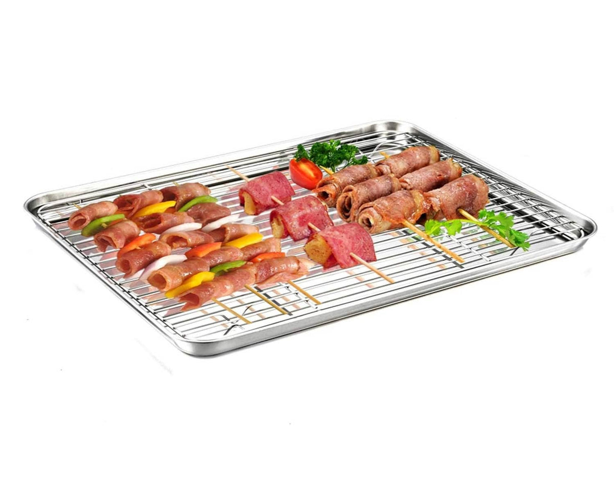 Stainless steel roasting rack tray with cooked meat and vegetables