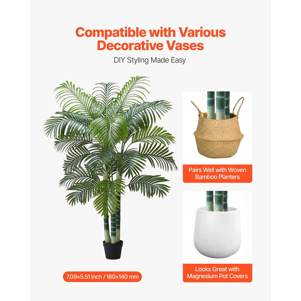 Faux areca palm tree with green fronds in white pot with striped stems