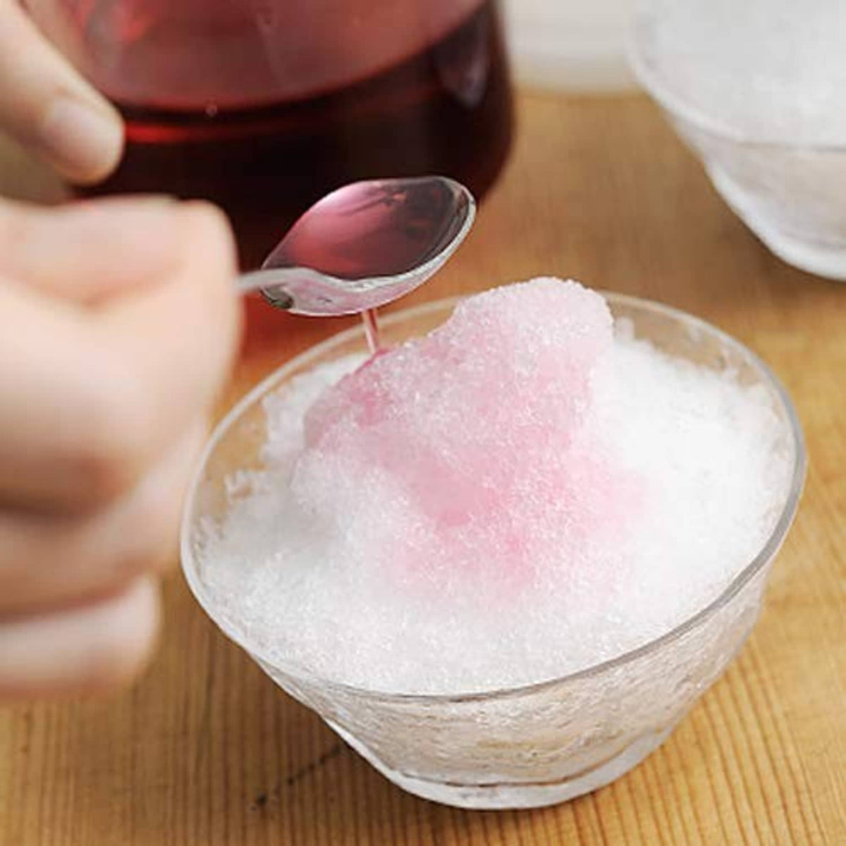DaVinci Irish cream syrup with pink crystal sugar in a small bowl