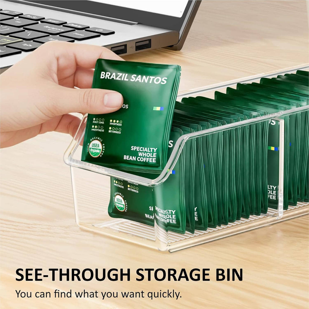 Transparent tea bag organizer bin with metal rack and a tea packet being placed