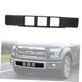 Black front lower grille trim panel with four vertical bars for pickup bumper