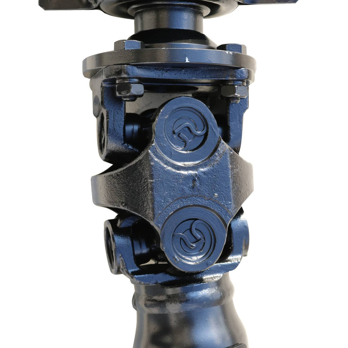 Rear driveshaft u-joint housing with stamped circular marks and bolt points