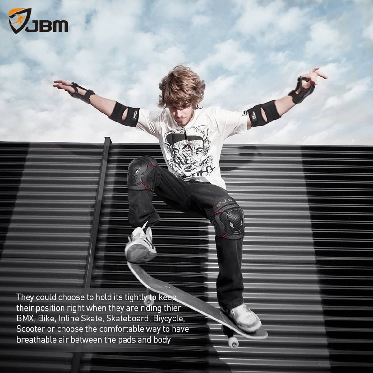 Person wearing black bike knee and elbow pads with wrist guards during a jump pose.