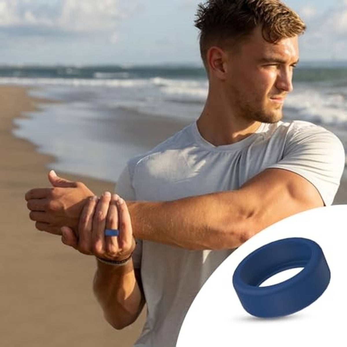 Blue silicone ring protector sleeve worn on wrist/hand, open circular sensor window