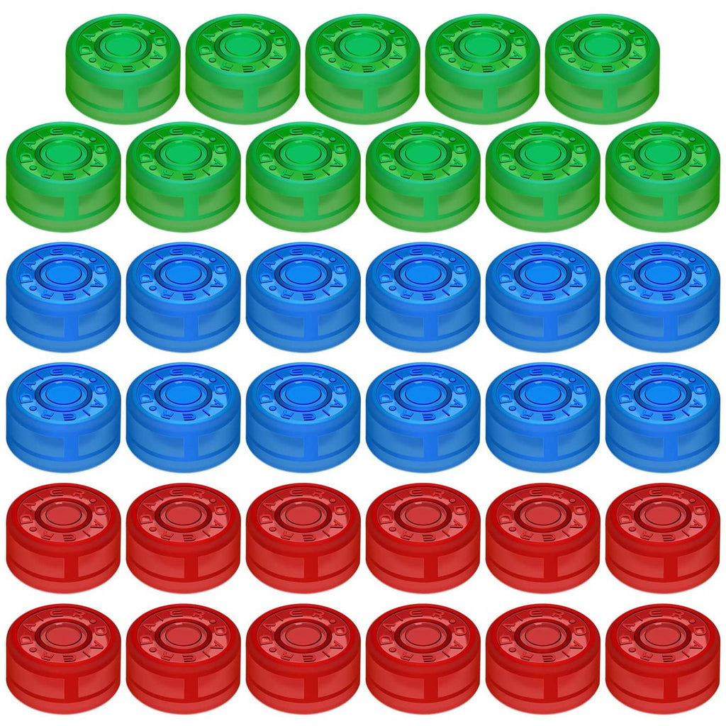 Glow-in-the-dark footswitch topper buttons, assorted green, blue, and red caps