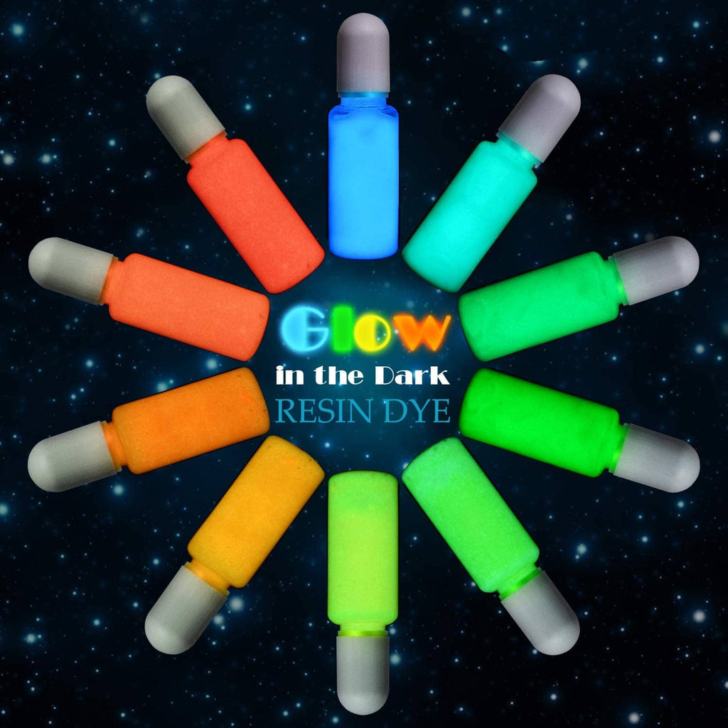 Assorted glow-in-the-dark resin dye bottles with blue, green, and orange colors