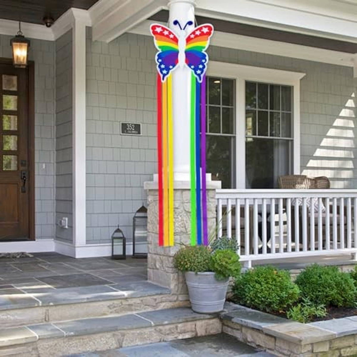 Hanging butterfly windsock with rainbow ribbon streamers and star-spangled wings