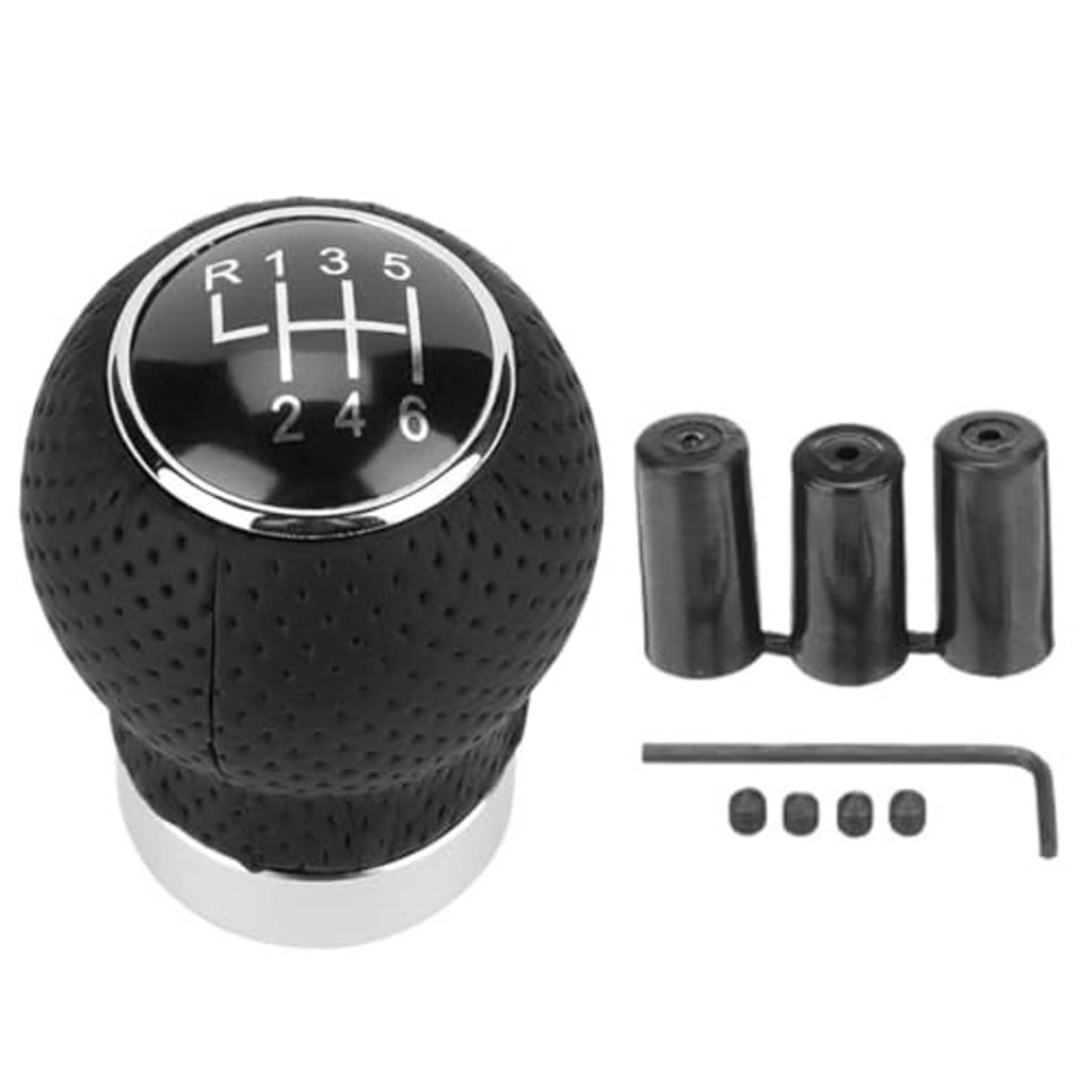 Black round 6-speed shift knob with chrome bezel and included adapter pieces and hardware