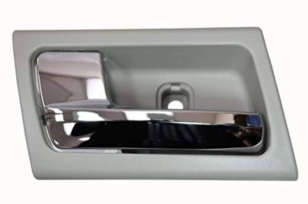 Gray interior door handle with chrome lever in recessed opening