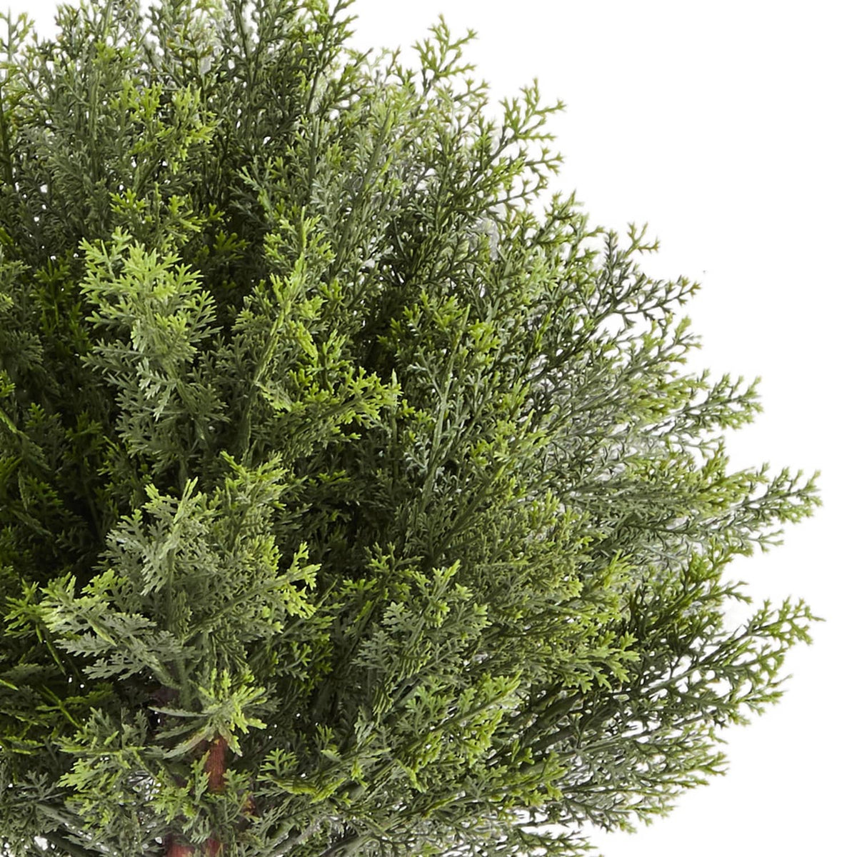 Artificial cypress topiary tree with dense green faux needles, side foliage close-up
