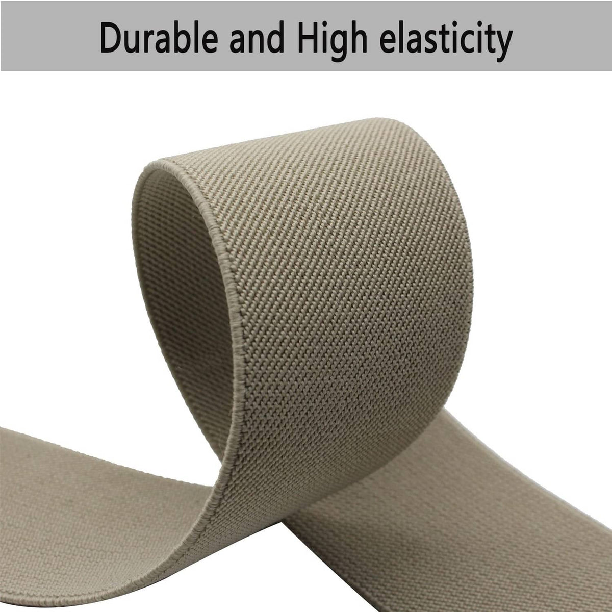 Grey elastic band with curved loose end showing woven texture