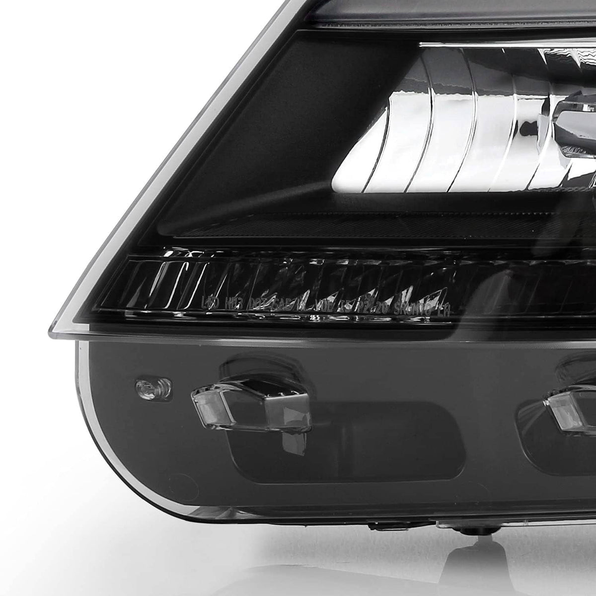 Headlight assembly with LED DRL, black housing and clear lens with chrome reflector