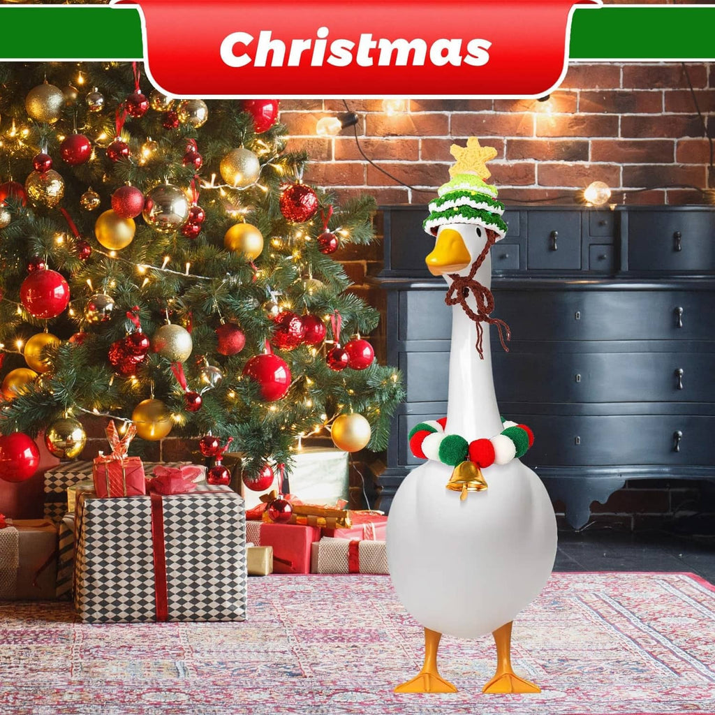 Single decorative porch goose wearing a green Christmas tree hat with gold accents