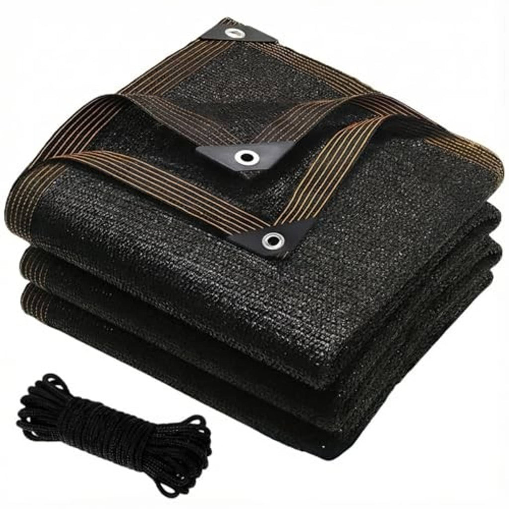 Black mesh shade cloth tarp folded, with metal grommets and included tie rope.