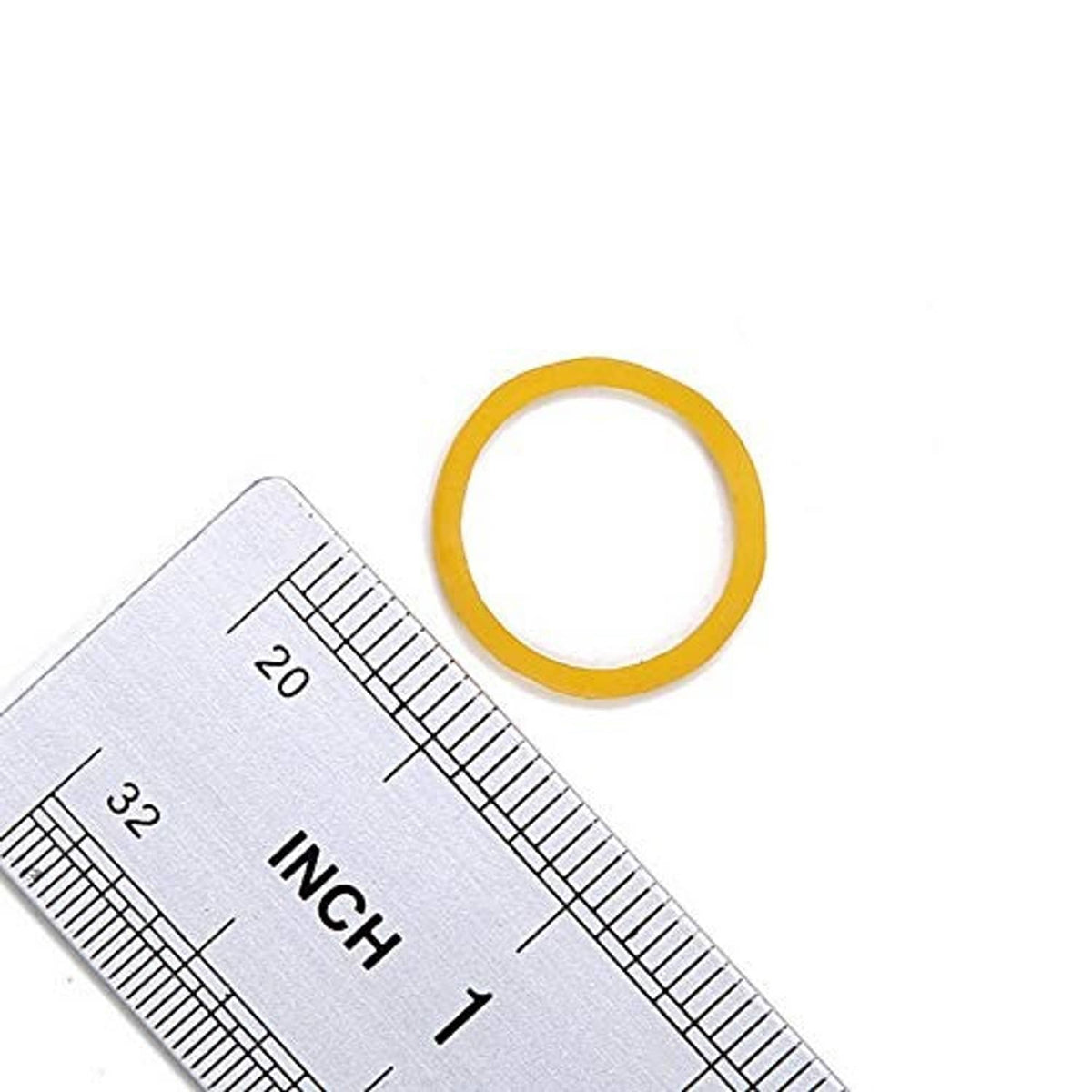 Single yellow mini rubber band next to an inch ruler