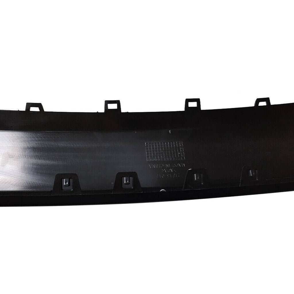 Matte black front bumper lower trim underside with molded text and clip mounts
