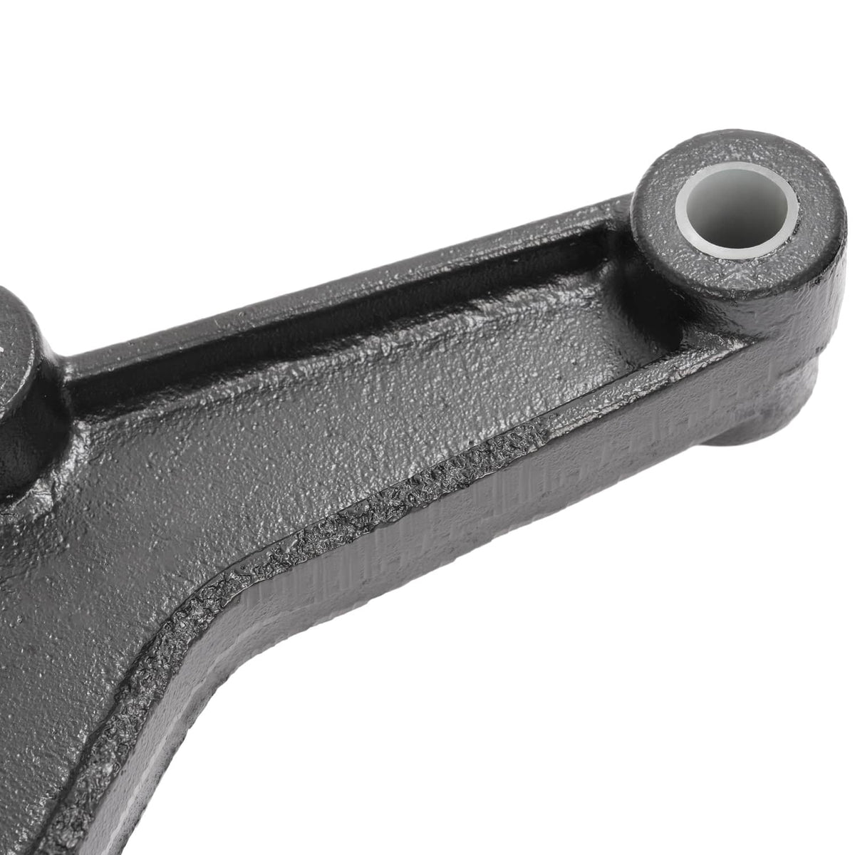 Close-up of black steel shackle arm with front bushing bore and mounting eye