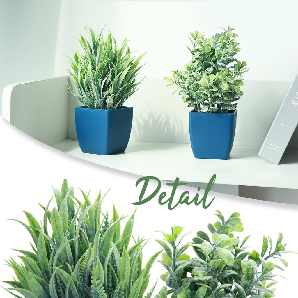 Pair of artificial plants in blue pots: bushy leafy and tall spiky eucalyptus