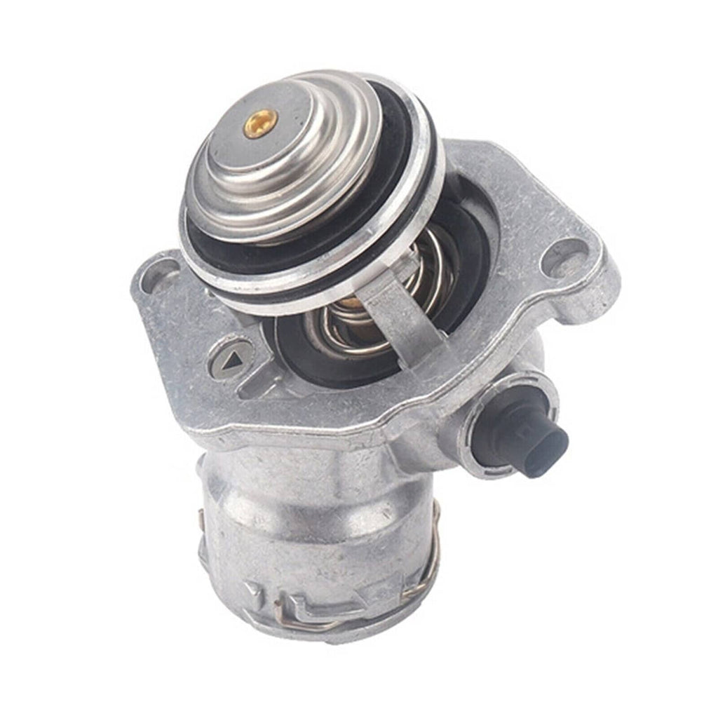 Engine coolant thermostat assembly with sensor, angled view of spring and sensor connector