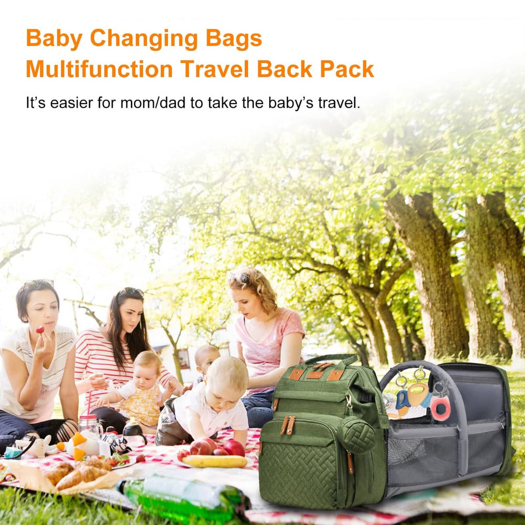 Green diaper bag with gray changing pad insert, travel backpack style straps