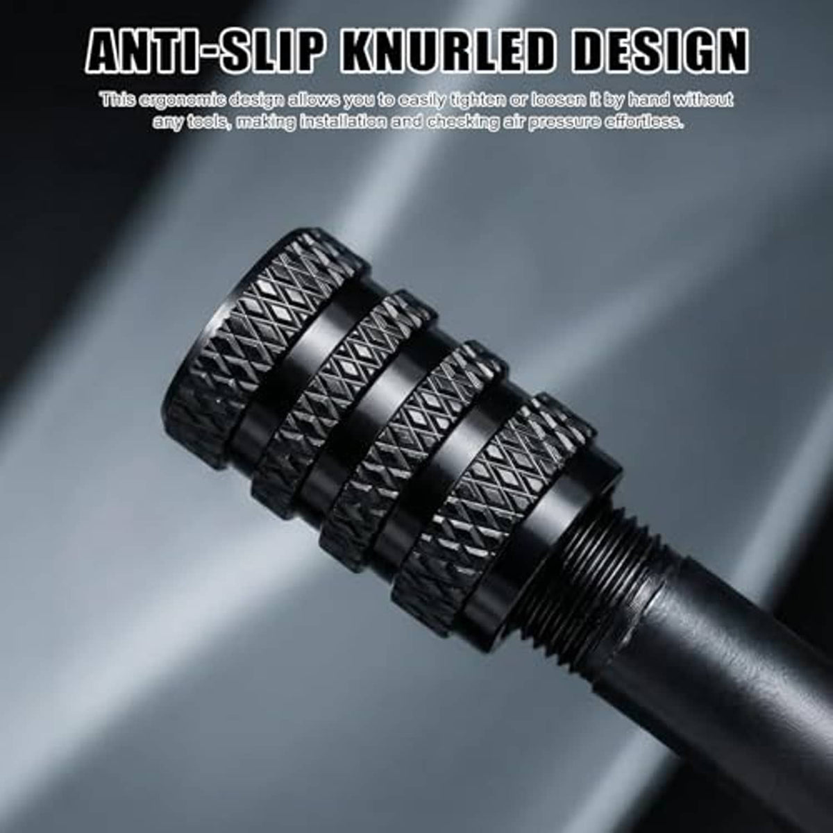 Close-up of black knurled tire valve stem cap threads and textured grip