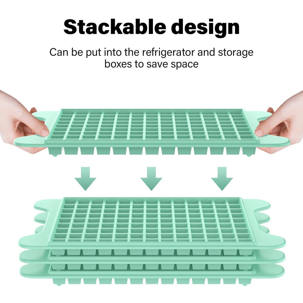 Stackable green mini ice cube trays held for filling