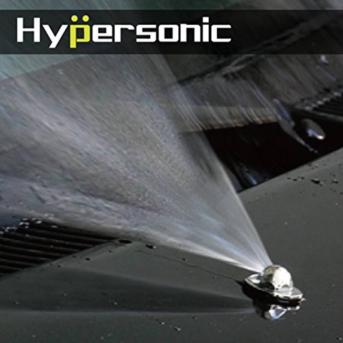 Windshield washer spray stream coming from a nozzle onto a car surface