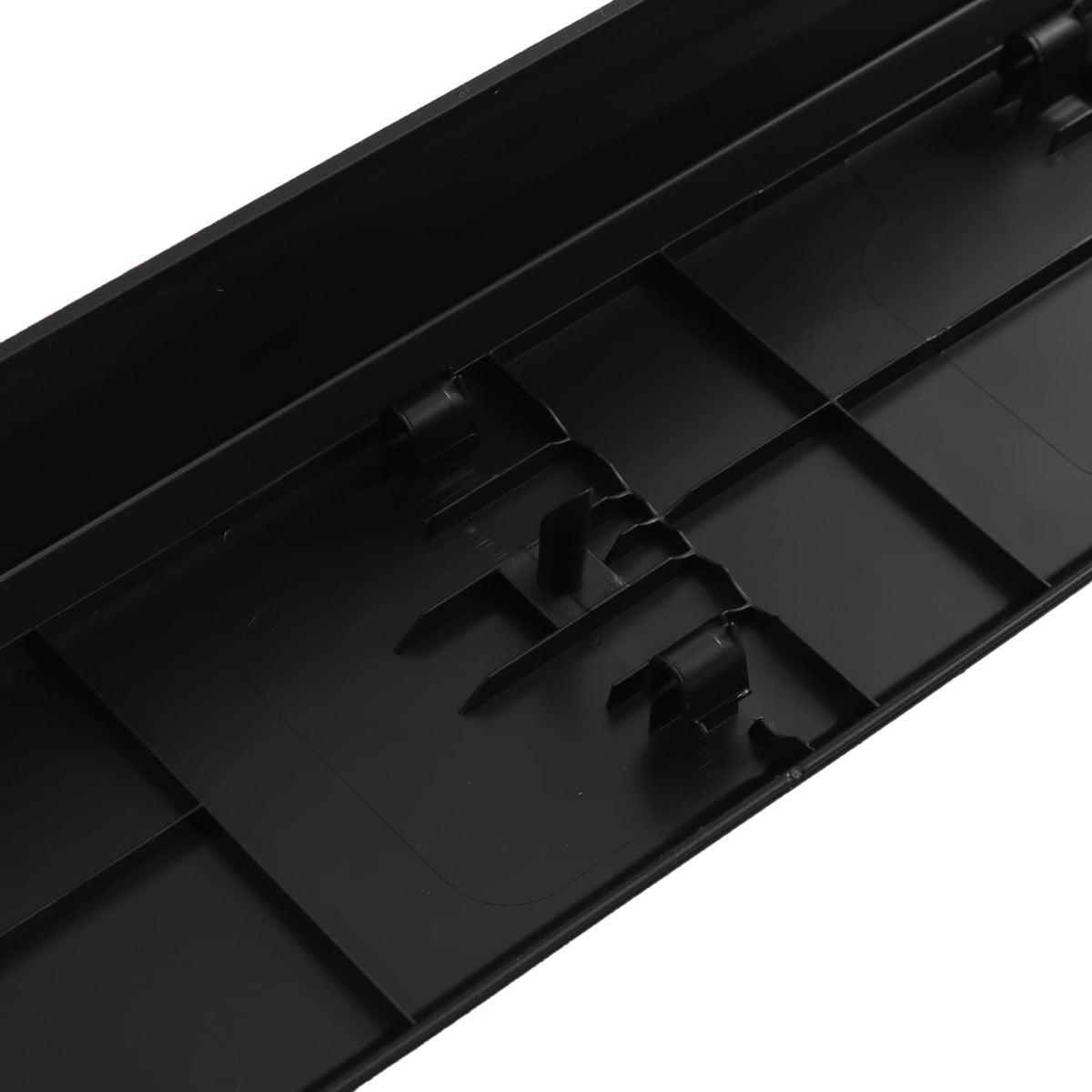 Black plastic tailgate bed cap molding underside with molded clip tabs