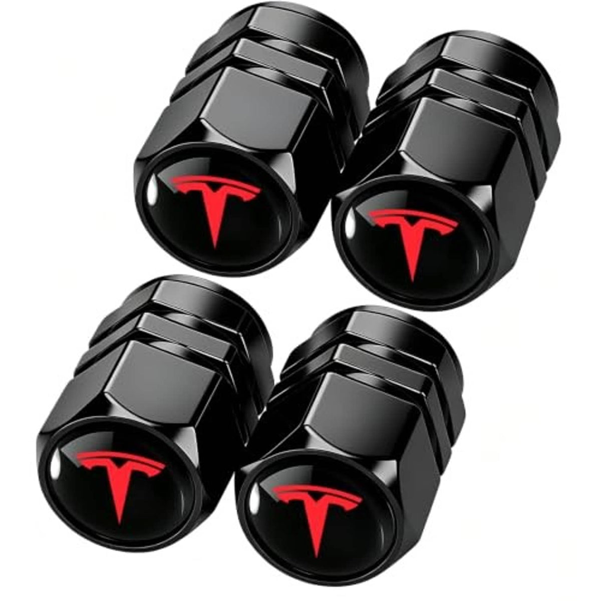 Four black metal tire valve stem caps with red emblem, hex collar and textured grip