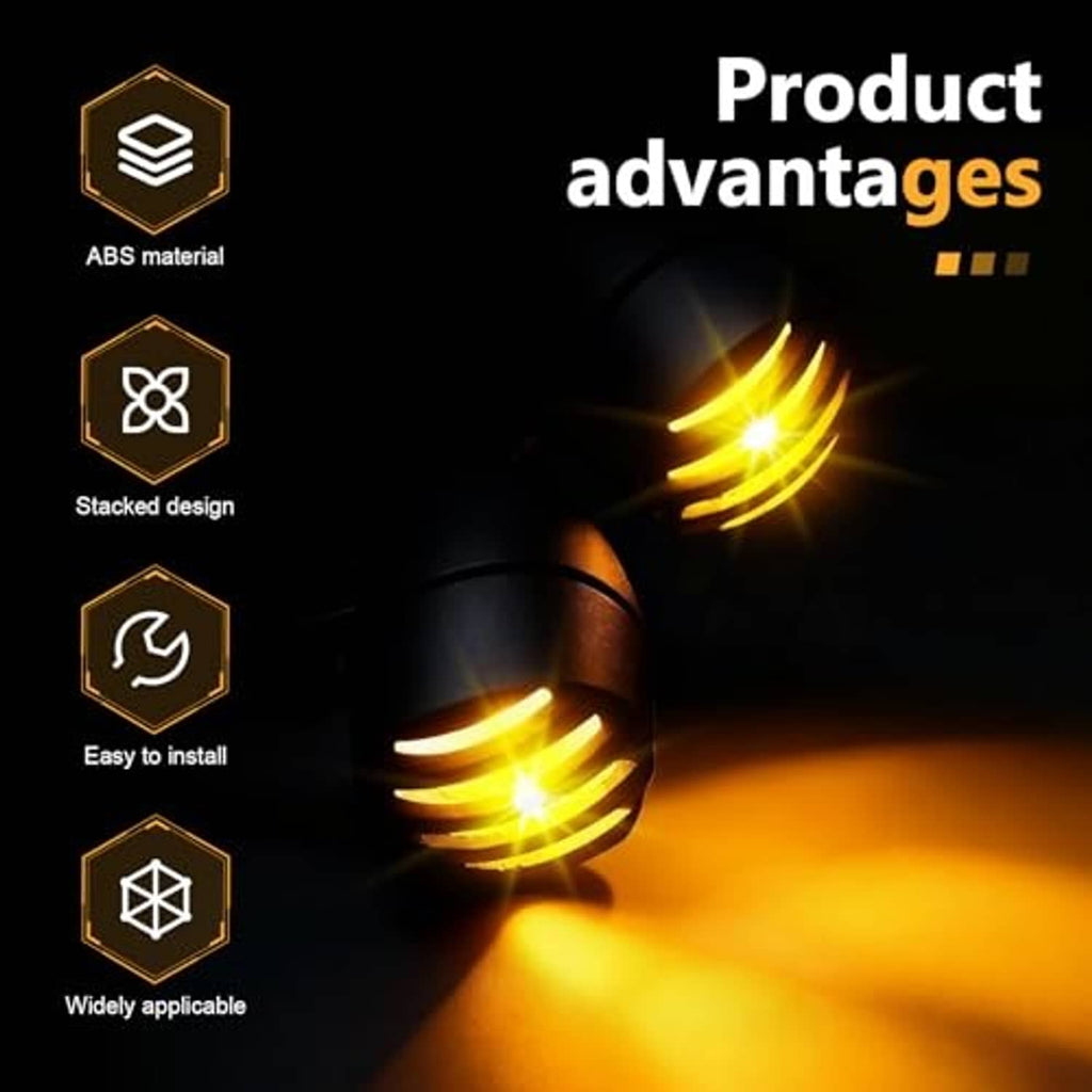 Black motorcycle LED turn signal with stacked amber light effect on the lens