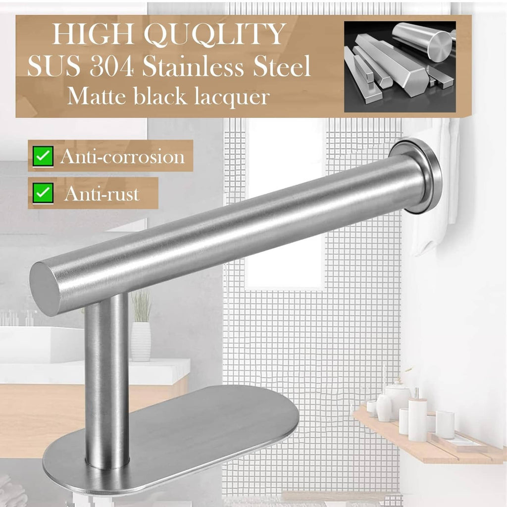 Brushed nickel toilet paper holder holding a paper roll on a wall-mounted bar