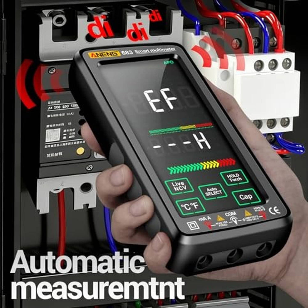 Black smart digital multimeter held by hand with touch-screen and attached test leads