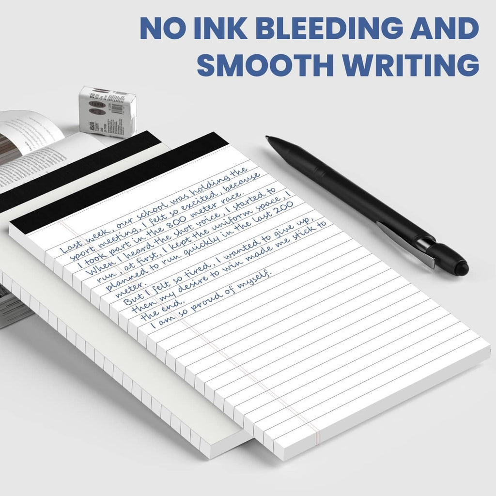 White college-ruled note pads with handwritten notes and a black pen
