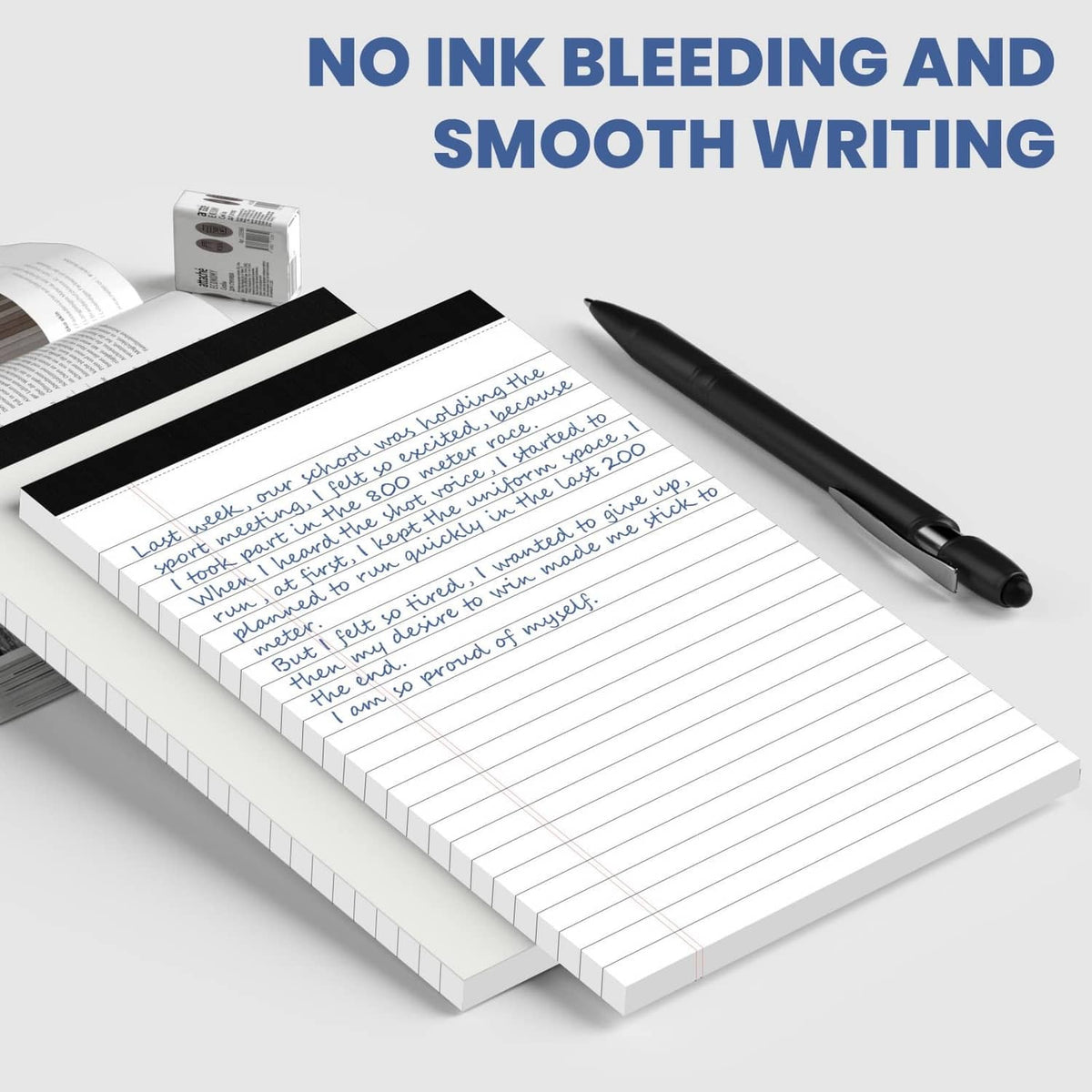 White college-ruled note pads with handwritten notes and a black pen