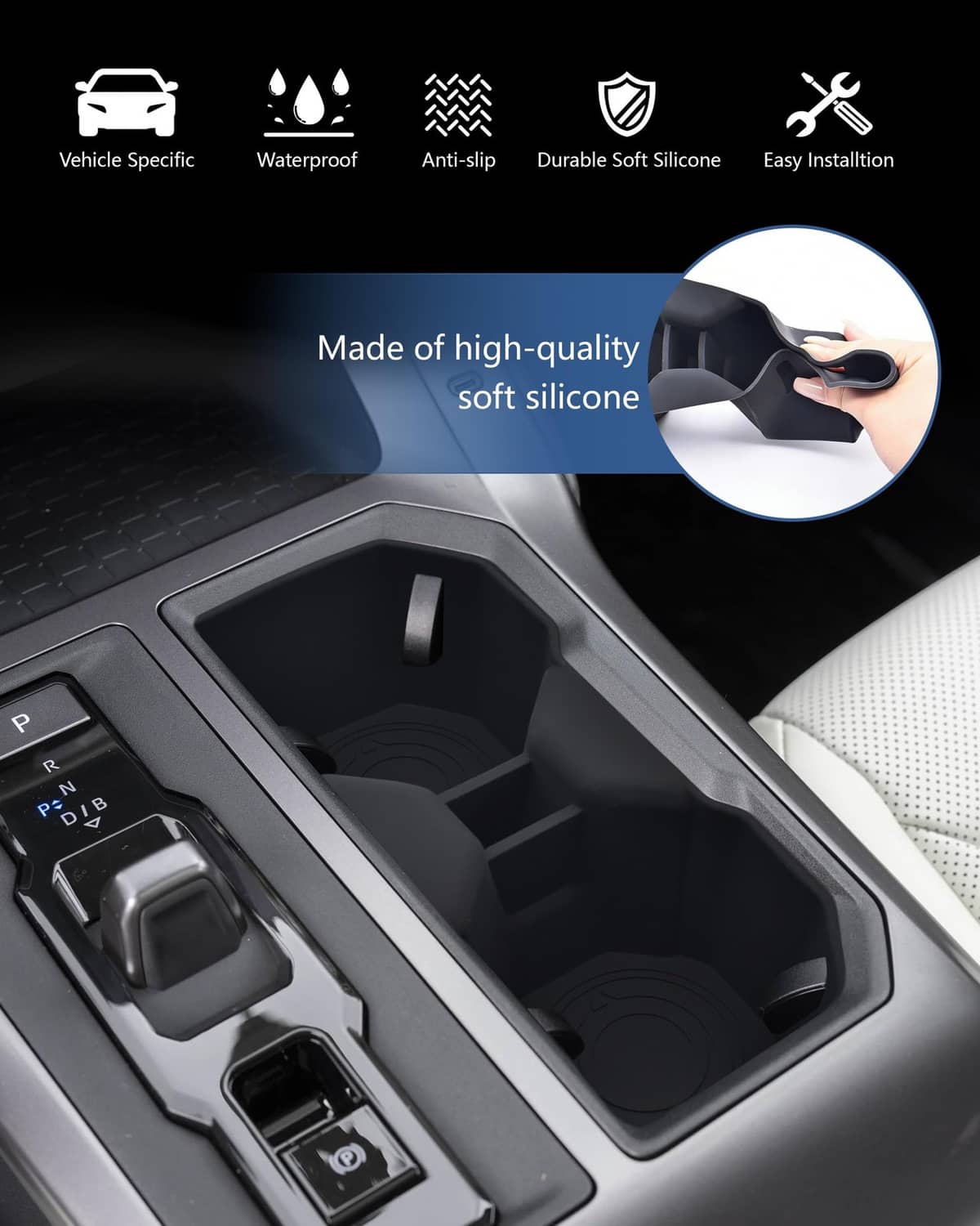Black cup holder insert with blue outline and two raised drink slots in car console