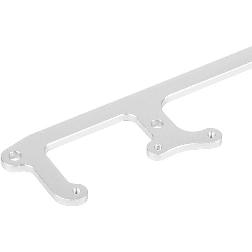 Billet aluminum coil bracket close-up, silver metal with corner bolt holes