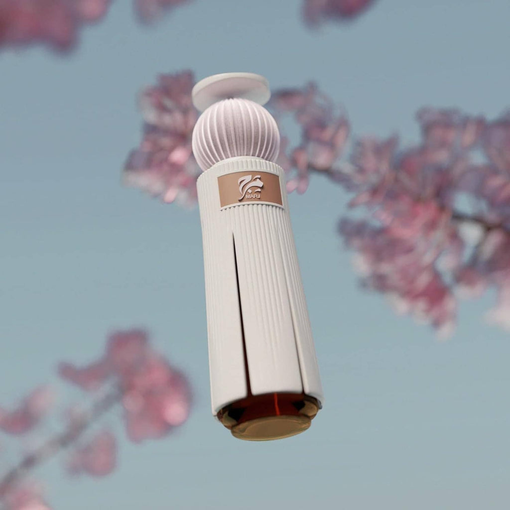 Extrait de parfum spray bottle, white with rose-pink ribbed cap and amber base