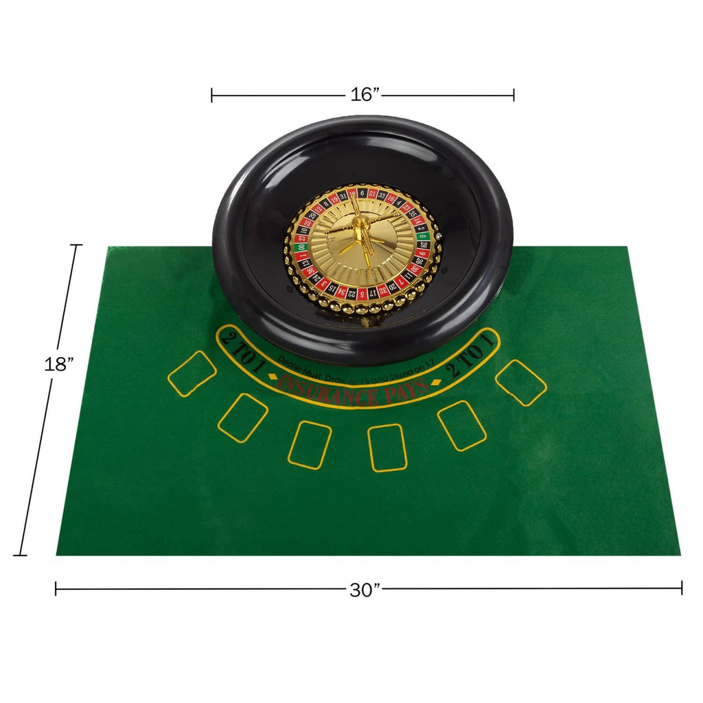Roulette gambling wheel with black rim and gold center spin top on green felt mat