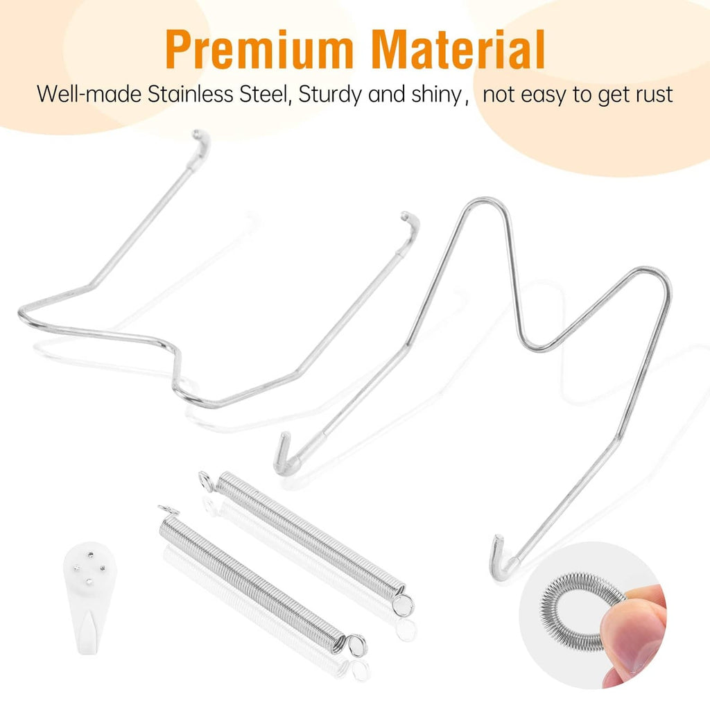 Stainless steel plate wall hanger with curved prongs, white tip protectors, and spring