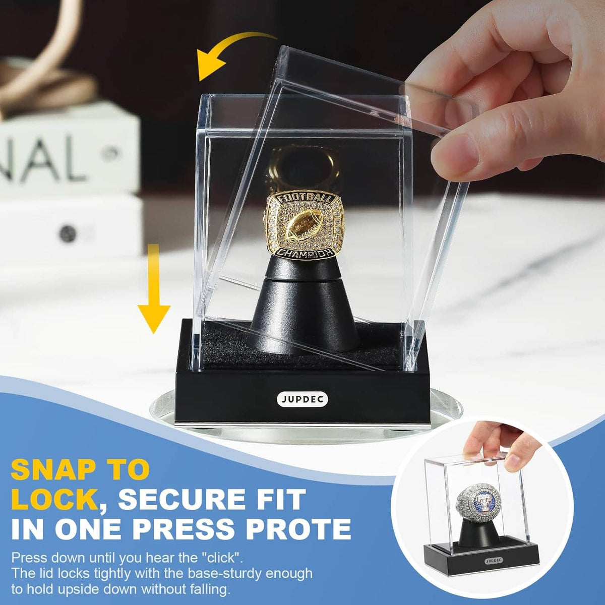 Clear acrylic single ring holder case with black cone base, lid being snapped shut by hand