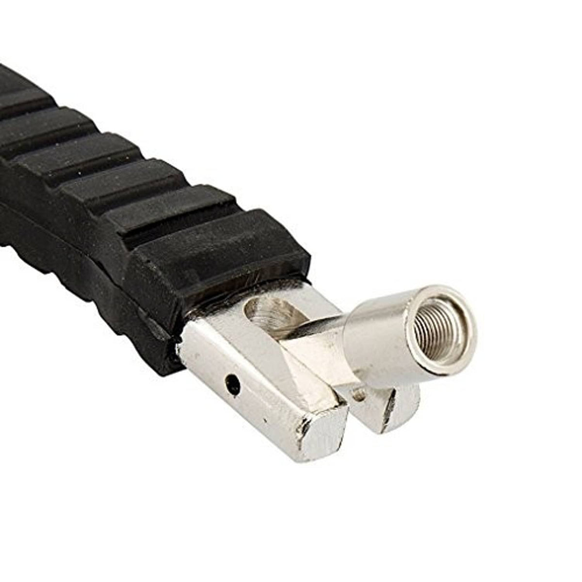 Metal tire valve stem remover tool with silver jaw and threaded brass valve core end
