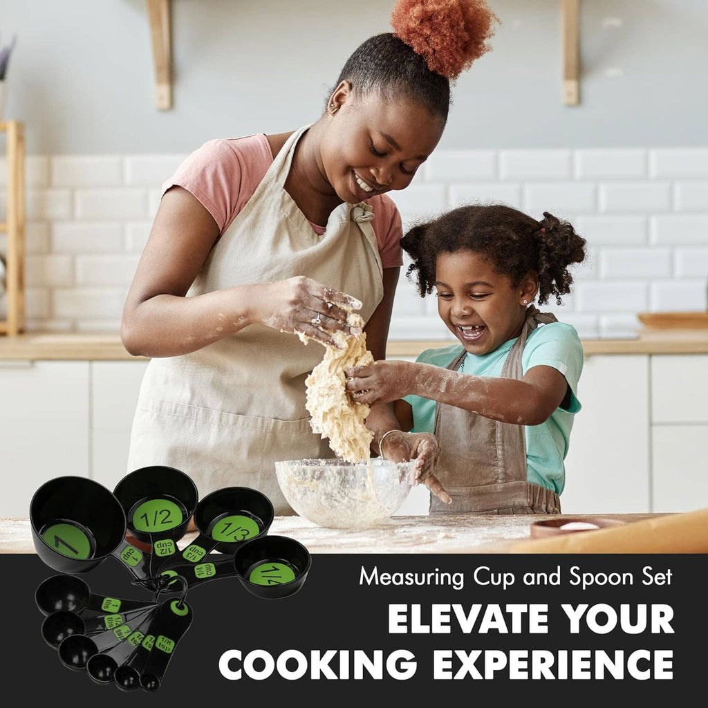 Green plastic measuring cup and spoon set with embossed measurement markings