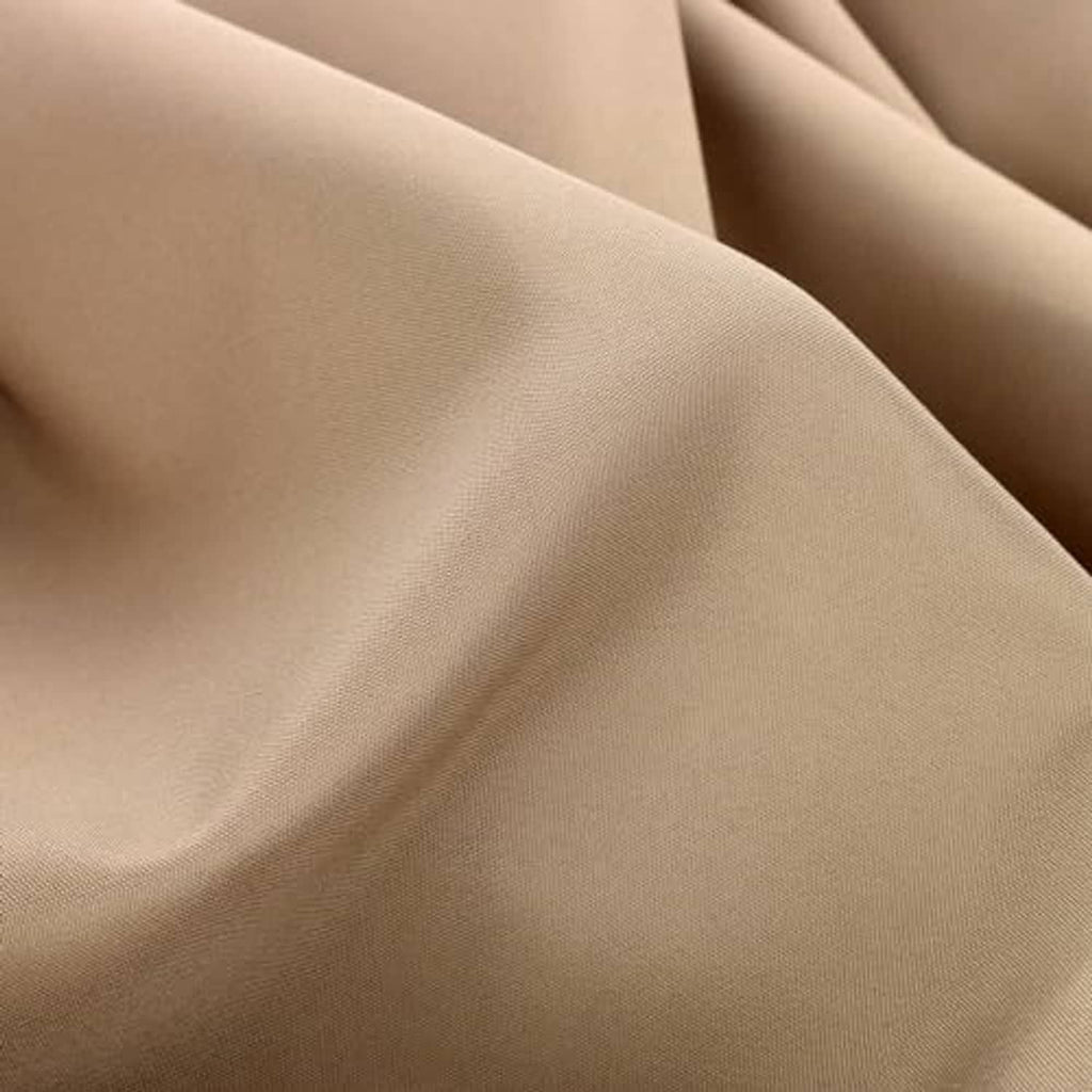 Beige umbrella cover fabric folds, close-up