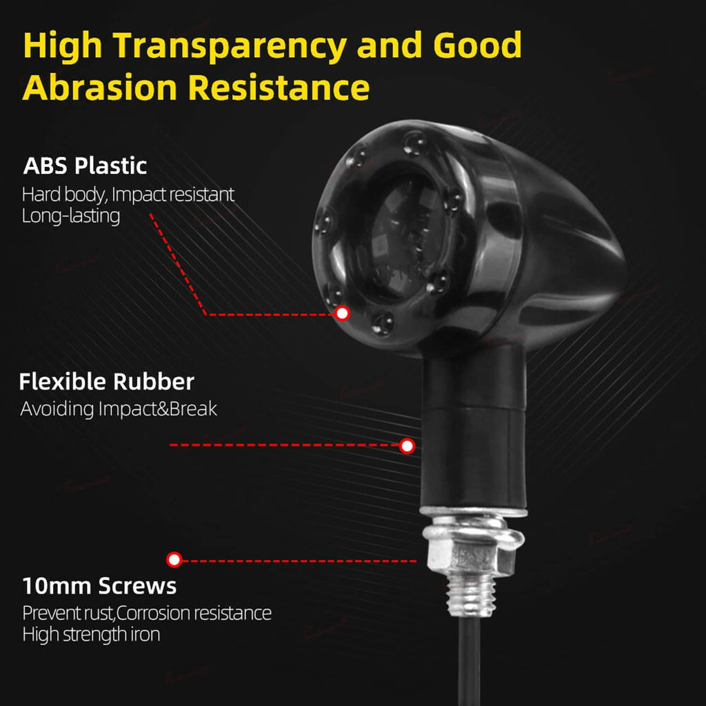 Motorcycle LED turn signal indicator with clear round lens and durable black housing details