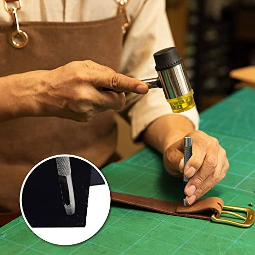 Hands using a grommet tool to set a bronze eyelet into leather