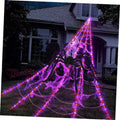 Halloween spider web string lights with large black spider and glowing purple LED strands