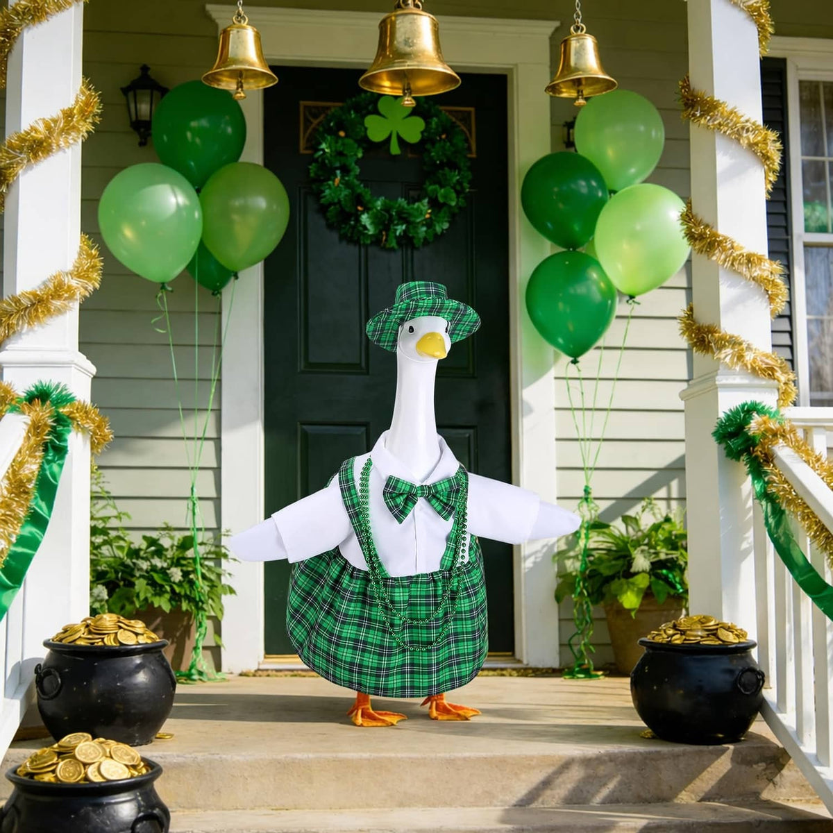 Goose decoration in green plaid pinafore dress with white shirt, bow tie and plaid hat